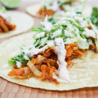 Sweet potato tacos with sprout slaw and chipotle cream