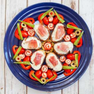 Smoked salmon pinwheels and prosciutto crostini