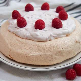 Pavlova with raspberries and cream