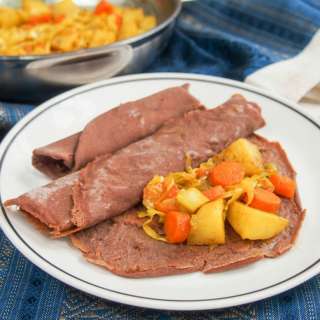 Ethiopian injera and tikel gomen (cabbage, carrots and potato)