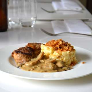 Pork lion with mushroom sauce