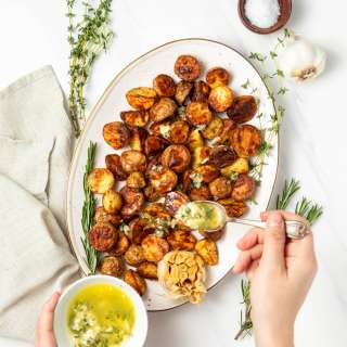 Air Fryer Potatoes with Garlic Herb Butter
