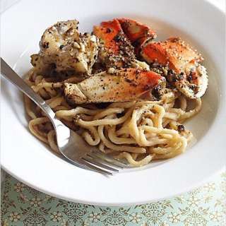 Crustacean Garlic Noodles and Roasted Crab