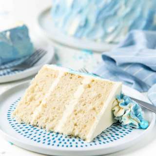 Coconut white cake with lemon Swiss meringue buttercream