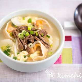 Tteok Mandu Guk (Korean Rice Cake Soup with Dumplings)
