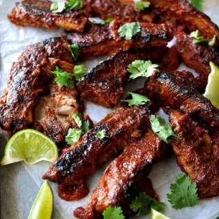 Fall Apart Oven Baked Ribs with Chipotle BBQ Sauce