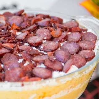 Traditional Romanian Polenta with Feta Cheese and Bacon