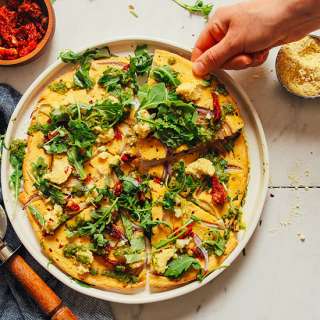 Socca Pizza with Sun-Dried Tomatoes & Pesto
