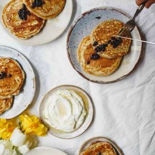 Easy Fluffy Pancakes Drizzled in Homemade Berry Simple Syrup