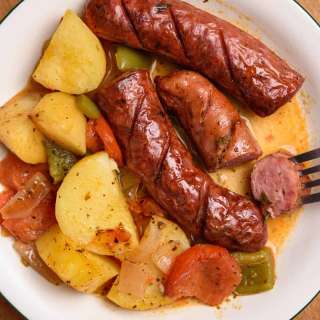 Sausage and Potato Casserole with Peppers, Tomatoes, and Onions