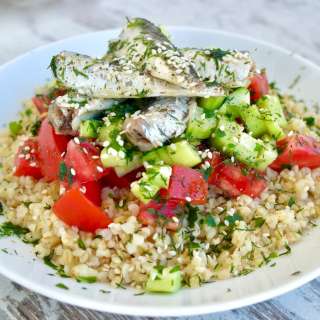 Mediterranean Bulgur Salad with Cucumbers, Tomatoes, Sardines and Fresh Herbs