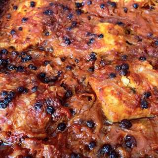 Sheet-Pan Greek Roasted Cod and Potatoes with Caramelized Onions, Tomatoes and Raisins - Bakaliaro Plaki