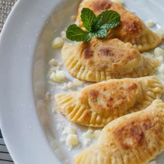 Kremmydopitarakia Milou (Greek Onion, Mint, and Cheese Crescents)