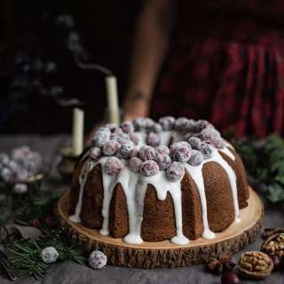 Cranberry and walnut bundt cake with frosted cranberries