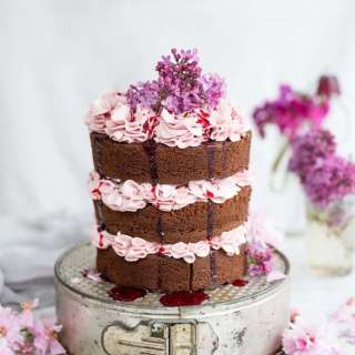 Chocolate layer cake with blackberry Italian buttercream