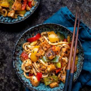 Stir-fried crispy tofu and peppers in tomato garlic sauce