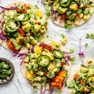 Chipotle Lime Salmon Tacos with Corn Avocado Peach Salsa & Cilantro Yogurt Sauce