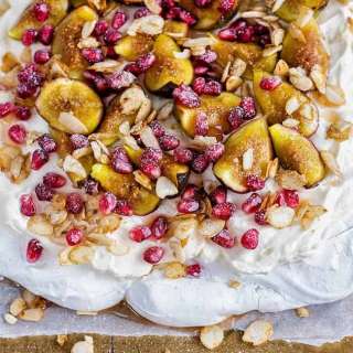 Festive Rosewater Pavlova with Syrup-soaked Figs and Pomegranate