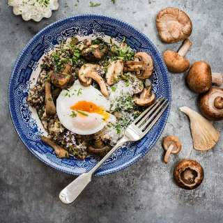 Vegetarian mushroom, spinach and quinoa risotto with oven-poached eggs