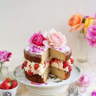 Rose layer cake with strawberries and cream