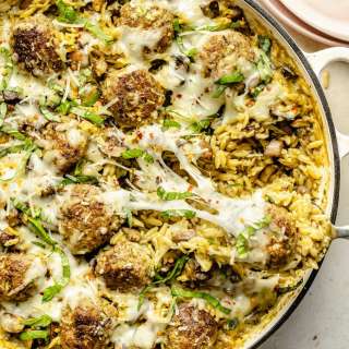One Pan Baked Pesto Orzo with Chicken Meatballs