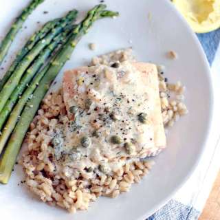 Garlic Poached Salmon with Creamy Lemon Caper Sauce