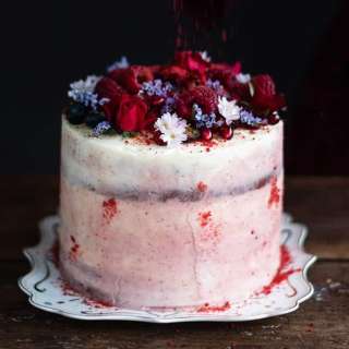 Red velvet layer cake with vanilla and strawberry frosting