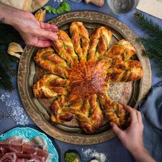 Puff pastry snowflake tart with walnut pesto