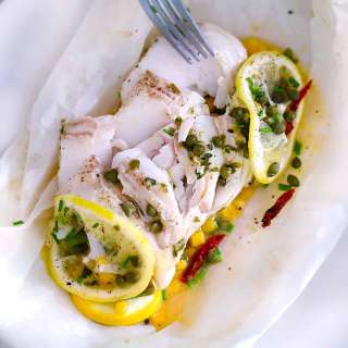 Fish en Papillote (Cod in Parchment Paper) with Veggies and Garlic Herb Butter