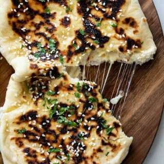 Cheese-stuffed garlic Naan bread