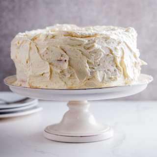 Lemon yoghurt layer cake with white chocolate frosting