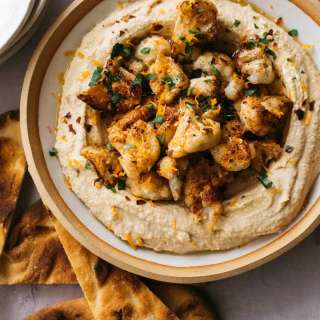 Spicy Roasted Cauliflower Over Hummus