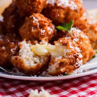 Mushroom arancini with roasted tomato sauce