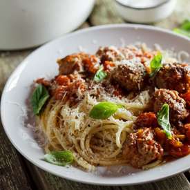 Meatballs cooked in rich tomato sauce