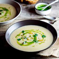 Celeriac & roasted garlic soup with parsley oil