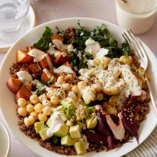 Light and Fresh Buddha Bowl Topped with a Creamy Roasted Garlic Cashew Sauce