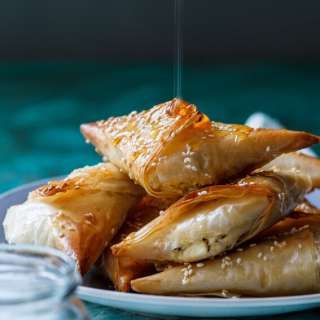 Greek Feta and phyllo pies with honey and oregano