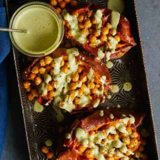 Roasted Chickpea Stuffed Sweet Potatoes with Cilantro-Garlic Cashew Sauce