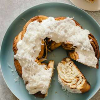 Browned Butter Braided Cinnamon Roll Cake Topped with Shredded Coconut