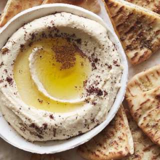 The Ultimate Hummus and Herbed Baked Pita Chips