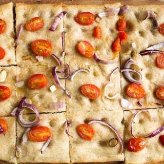 Sourdough focaccia with tomatoes and purple onions