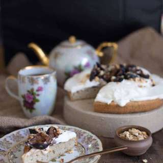 Stevia-sweetened grain-free vanilla cake with yogurt crema, roasted figs and hazelnuts as part of a healthy low sugar diet