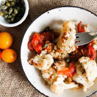 Roasted cauliflower with tomatoes and capers