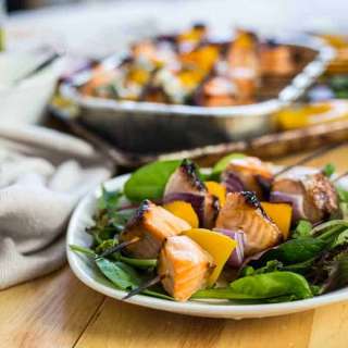 Peach salmon skewers with peach jalapeno crema