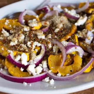Delicata squash with feta, red onions and dukkah spice mix