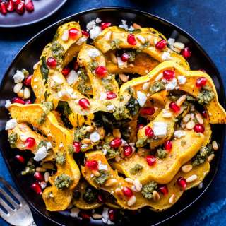 Roasted Squash with Pesto, Feta and Pomegranate Seeds