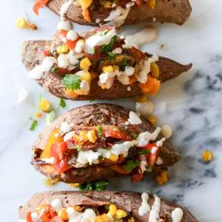 Veggie Fajita Stuffed Sweet Potatoes with a Chipotle Drizzle
