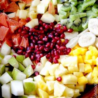 Tropical Winter Salad with Caramelized Cashews and Pomegranate Vinaigrette