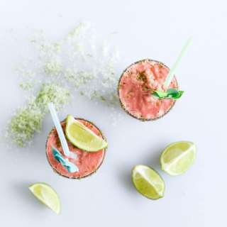 Layered Watermelon Coconut Shakes with Salty Lime Sugar.
