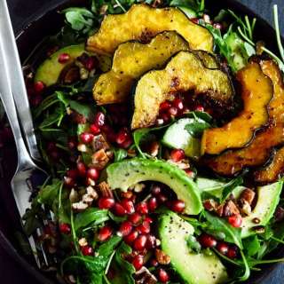 Autumn Arugula Salad with Caramelized Squash, Spiced Pecans and Pomegranate Ginger Vinaigrette